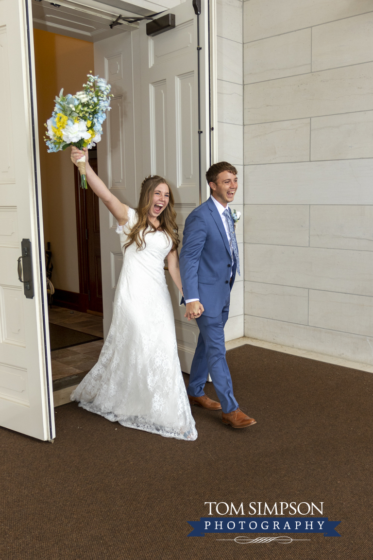 bride groom emerge from nauvoo temple doors