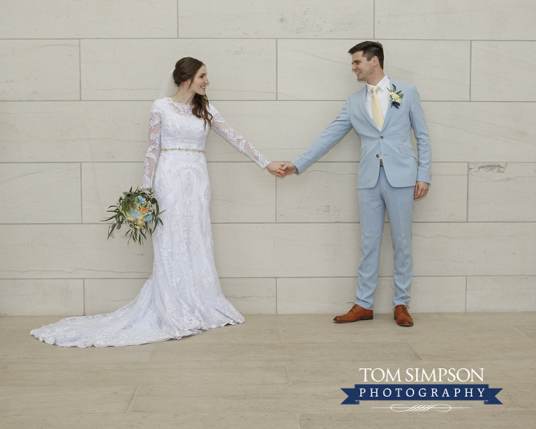 bride groom holding hands nauvoo temple