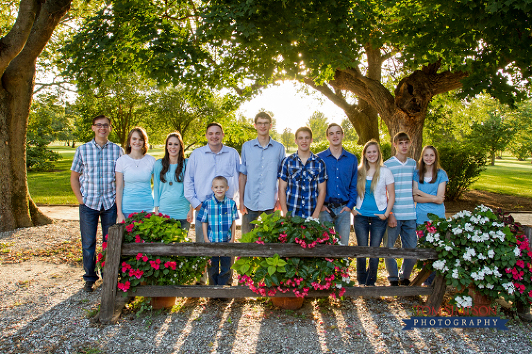 family outdoor portrait afternoon long shadow